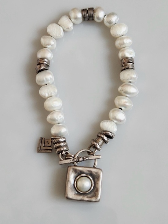Silpada Jewelry - Freshwater Pearl and Sterling Silver 

Discontinued Silpada Bracelet